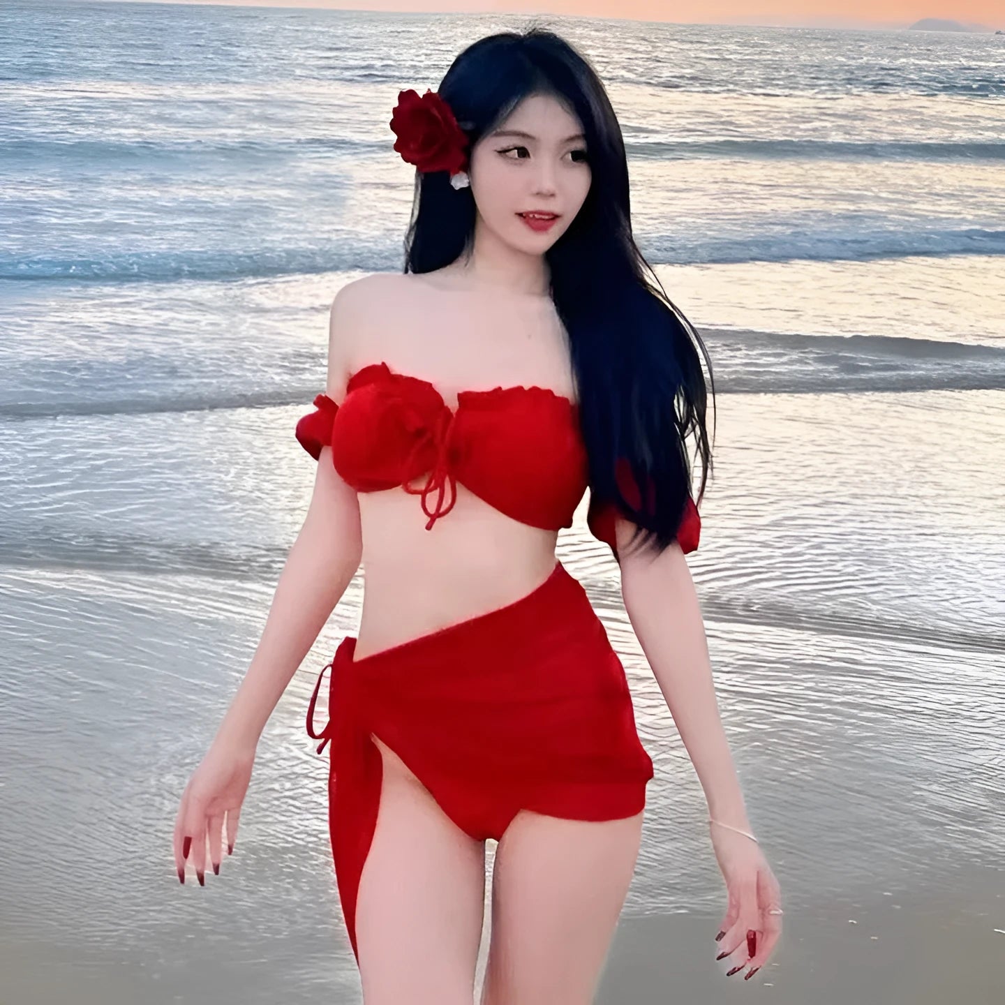 Red women's bikini swimsuit with puff sleeve top and skirt bottom