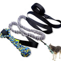 Green cotton dog tug rope toy with a ball design for bite and pull play.