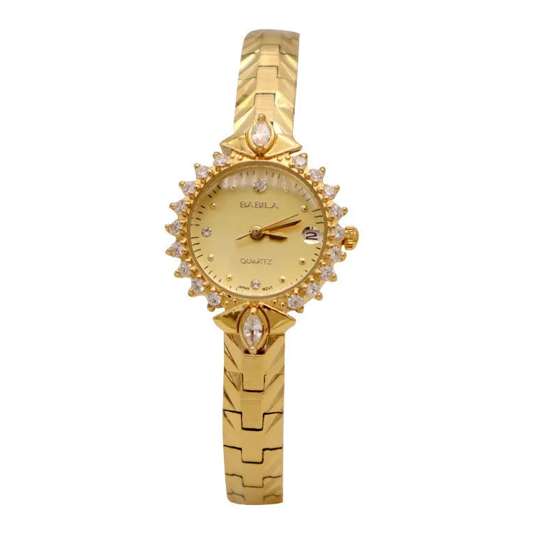 Vintage gold-toned ladies bracelet watch with diamond embossed links and quartz movement