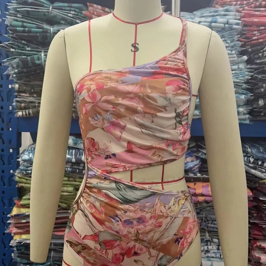 Women's rose gold pattern swimsuit made from polyester fabric available in multiple sizes
