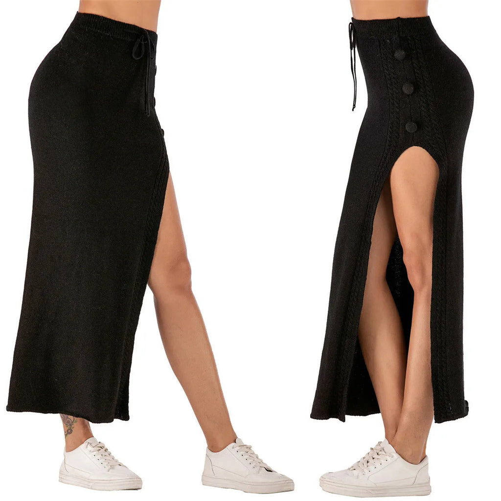 A woman's slim-fit black midi skirt with a high side split, made from acrylic fabric.
