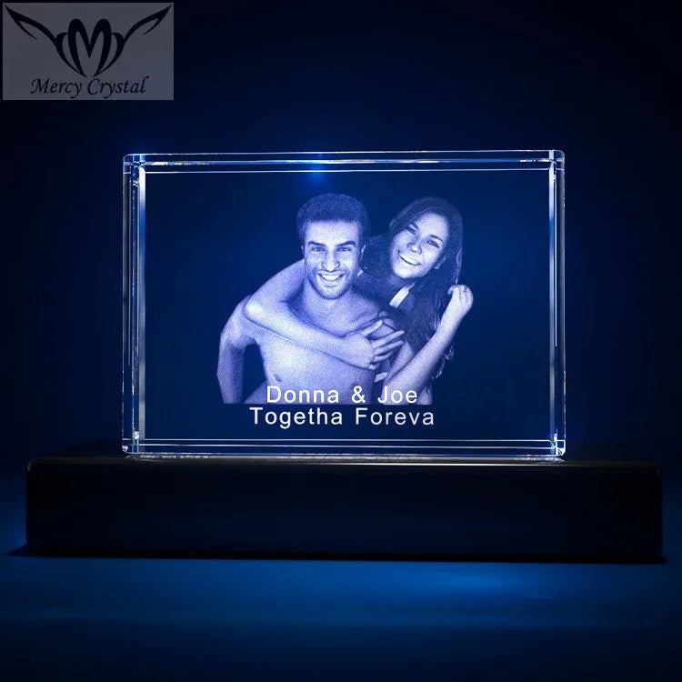 Custom laser engraved crystal sphere with personalised photo inside, available in multiple sizes and styles