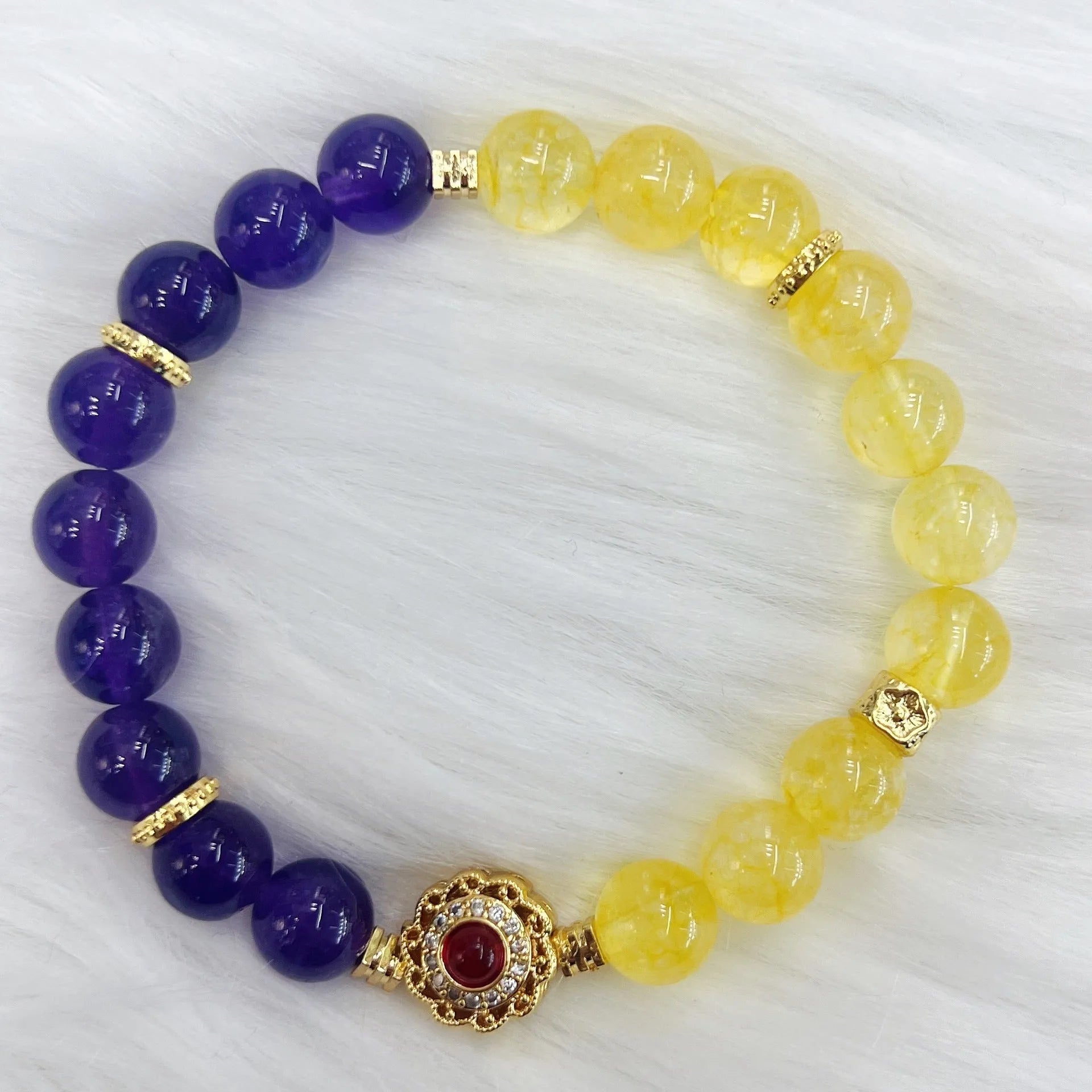 Handmade women's crystal bracelet in yellow and purple colours