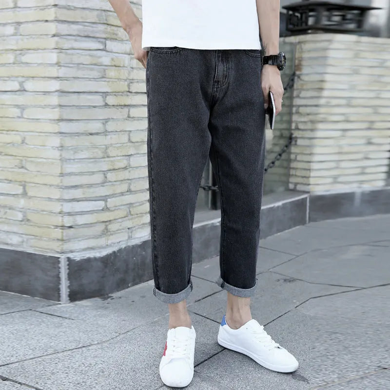 Men's loose straight harem jeans in black or blue cotton denim with high waist