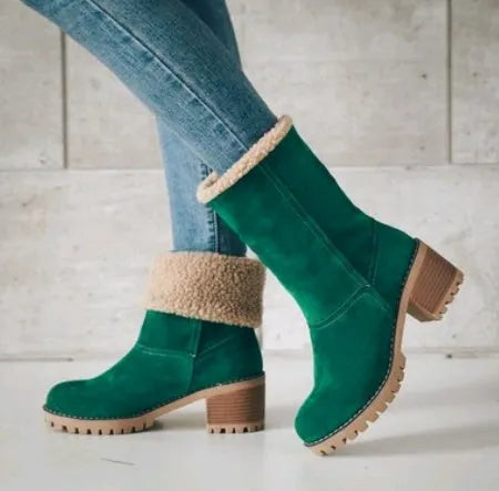 Women's black suede mid-tube snow boots with a thick flat heel and round toe on a white background.