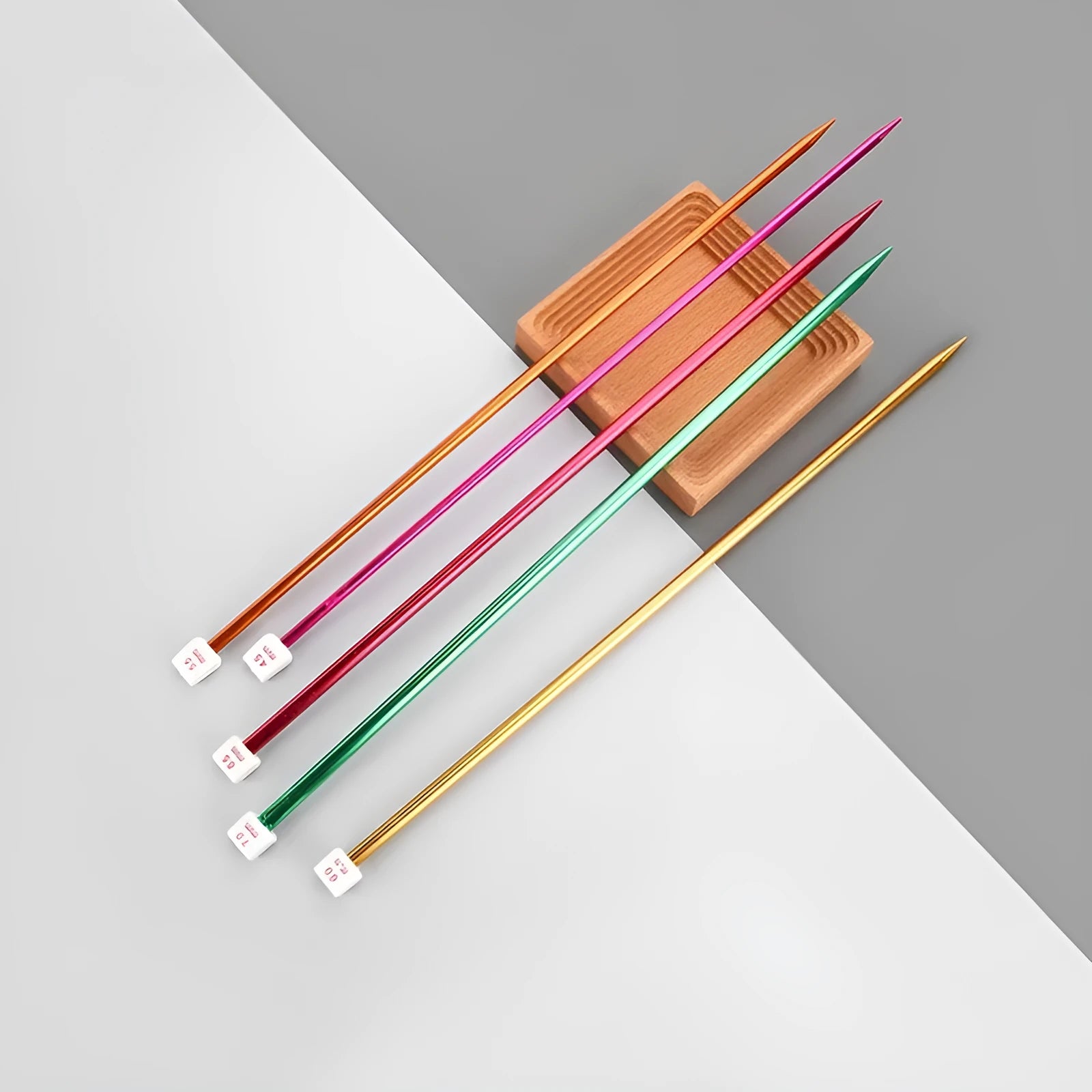 Extended reach crochet hook set showing metal caps and size range from 2.0mm to 10.0mm