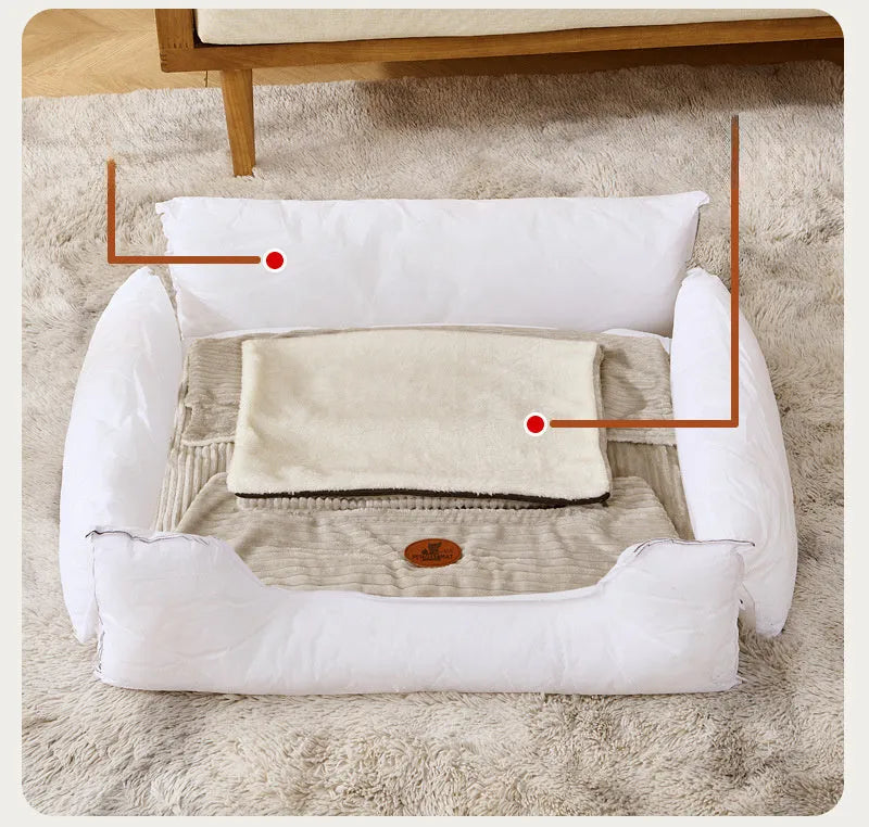 Coffee and white coloured removable washable dog kennel bed shown in small and medium sizes on a sofa and floor.