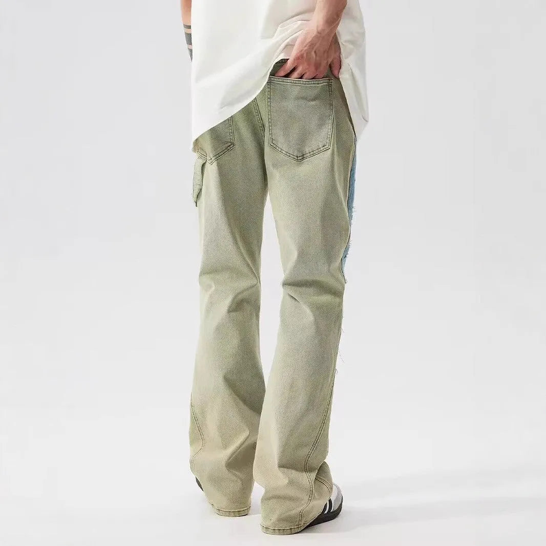 Yellow and blue retro patchwork splash-ink distressed design jeans on a mid-waist.