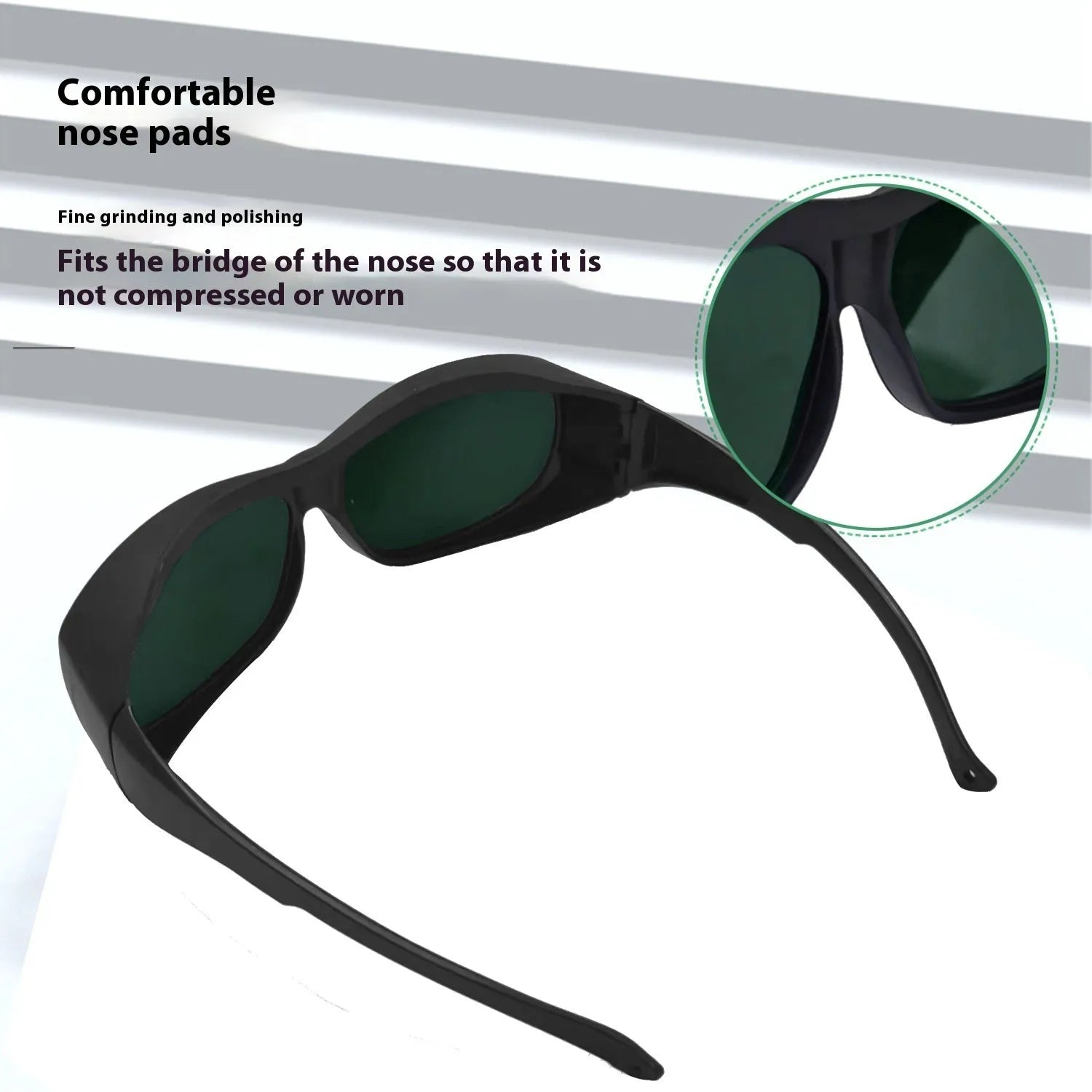 A pair of clear polycarbonate laser safety goggles for welding and skin treatment protection.