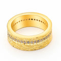 Gold geometric women's zircon ring made from electroplated copper on a grey background.