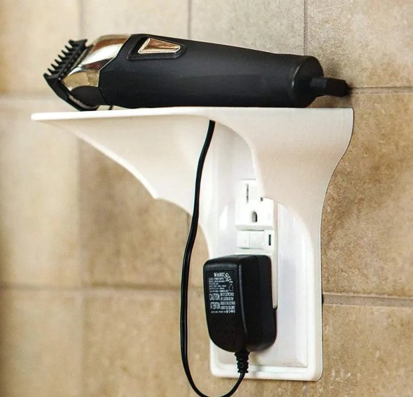 White polypropylene socket storage rack organiser with compartments, dimensions 14cm by 10cm by 15cm.