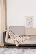 Blue cartoon dog pattern on a double-sided thickened flannel pet blanket laid flat.