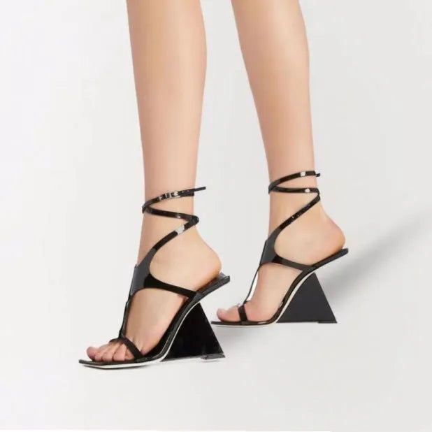 Women's black square-toe high heel sandals with a buckle fastening and 9.5cm block heel.