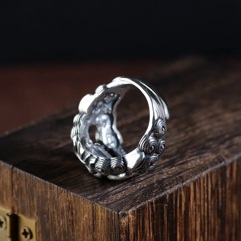 Silver open ring with domineering Jibeast animal Zodiac pattern and diamond detail.