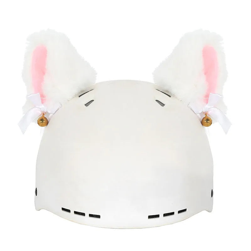 Plush cartoon-themed cover set on a medium motorcycle helmet with soft ear decorations.