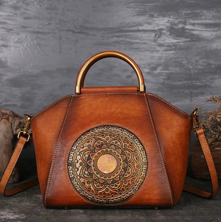 Genuine embossed leather messenger top handle bag in Graphite Grey with totem pattern
