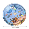 Ocean-themed blue water sensory playmat for cats with floating fish toys inside on a floor