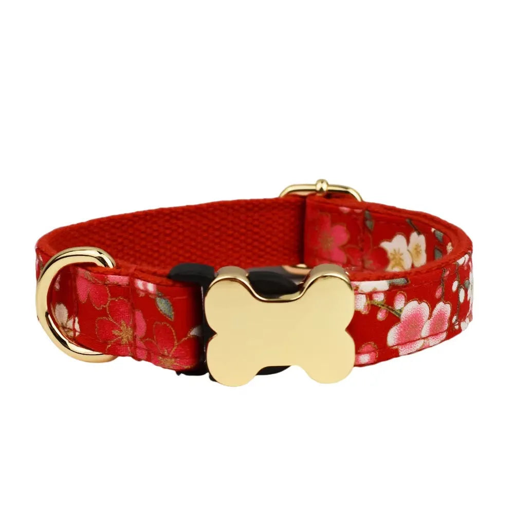 Flat printed grid nylon dog collar with a white bone-shaped plastic buckle on a green background.