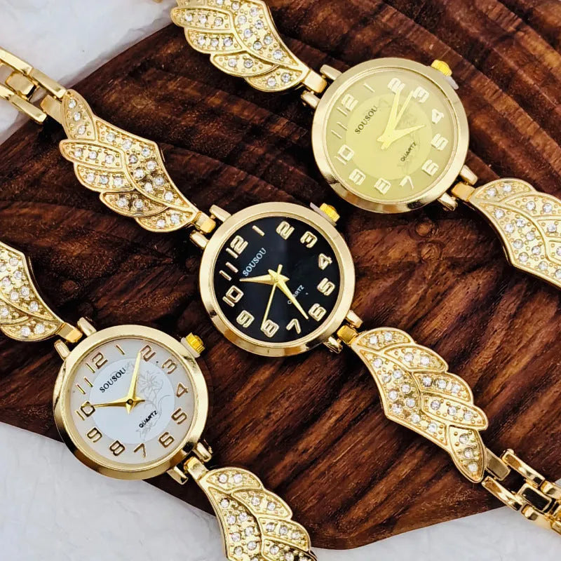 Women's stainless steel watch with gold face round dial and vachette clasp buckle