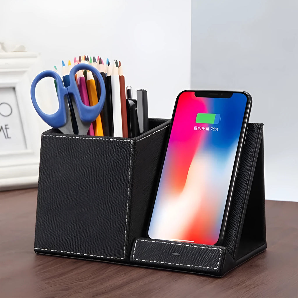 Black leather wireless charging station with pen holder compartment and phone charging surface
