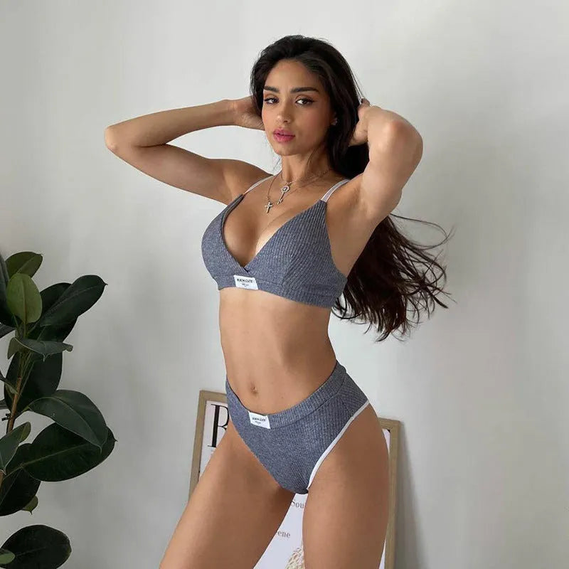 Women's grey embroidery bikini set with contrast colour binding and sleeveless shorts design