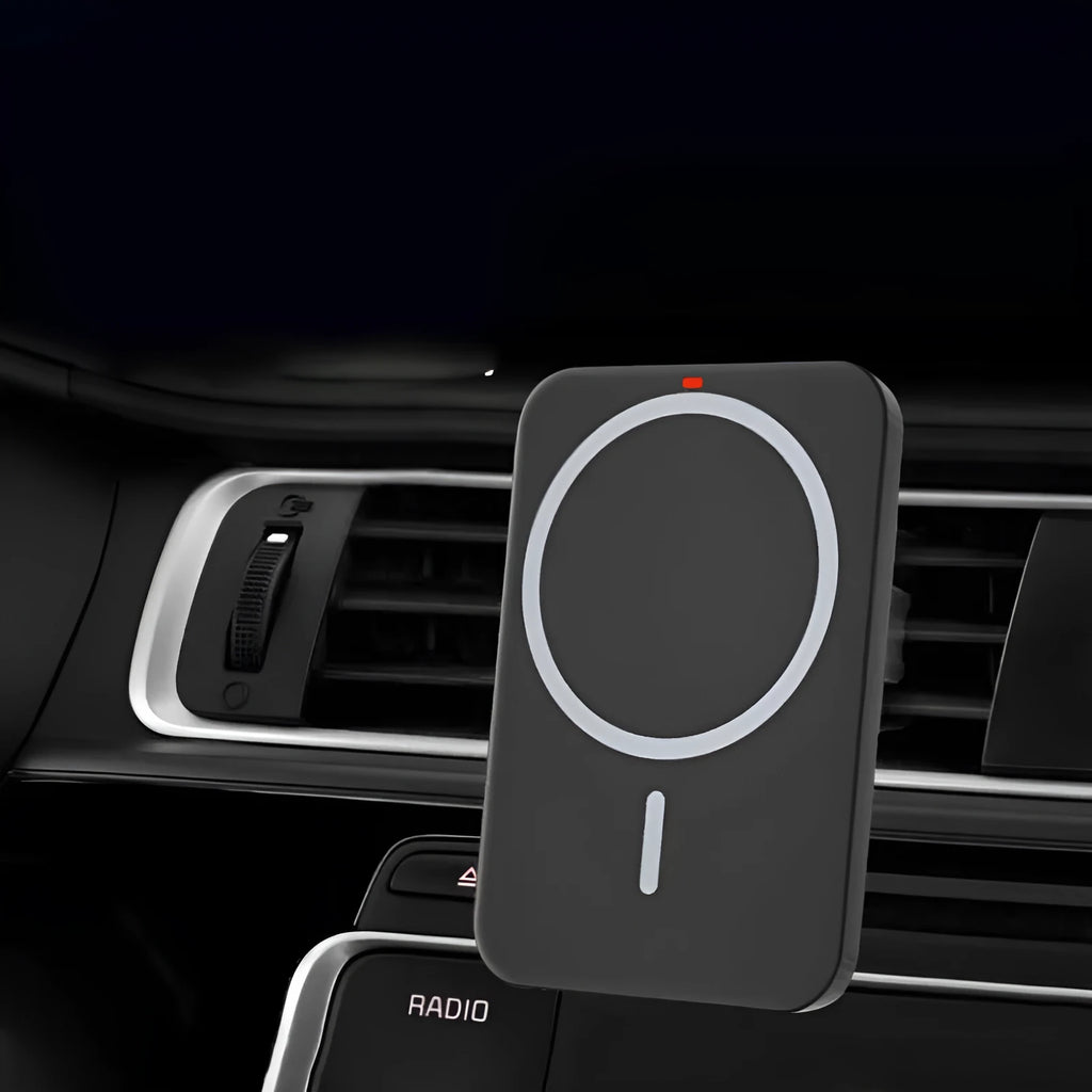 Black car magnetic wireless phone charger and bracket mounted on a car air vent.
