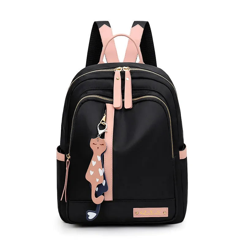 Black and pink views of a women's casual nylon backpack with double straps, a soft handle, and an external pocket.