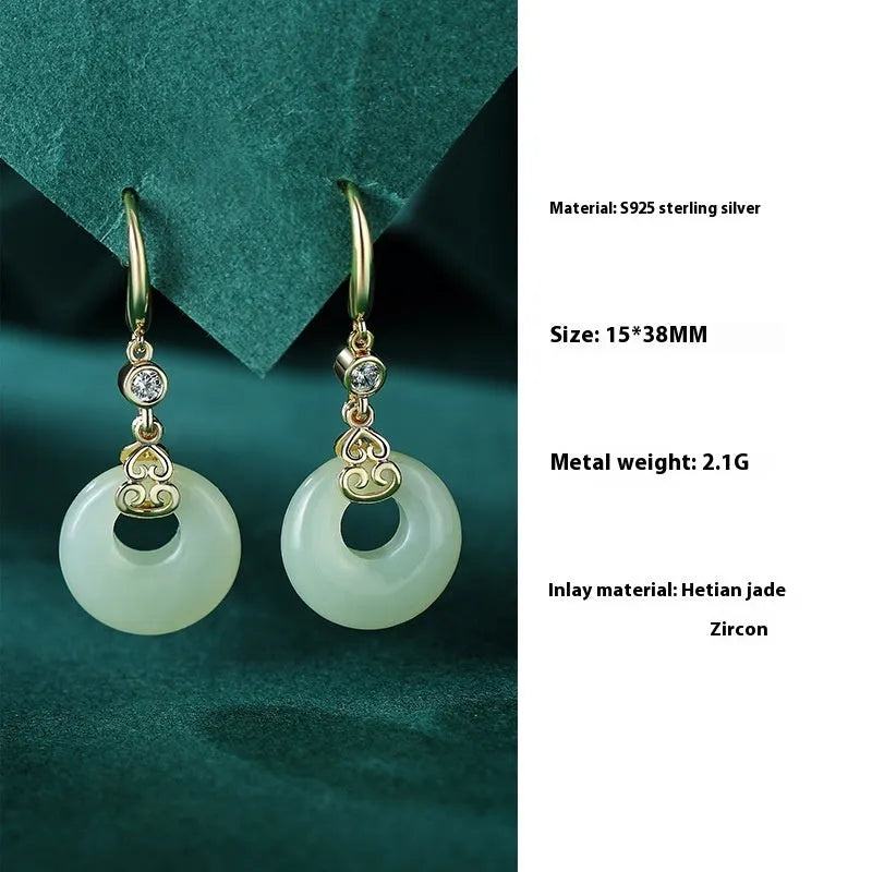 Chinese style sterling silver jewellery set showing gourd bracelet, Fu character necklace, and earrings with Hetian jade inlay.