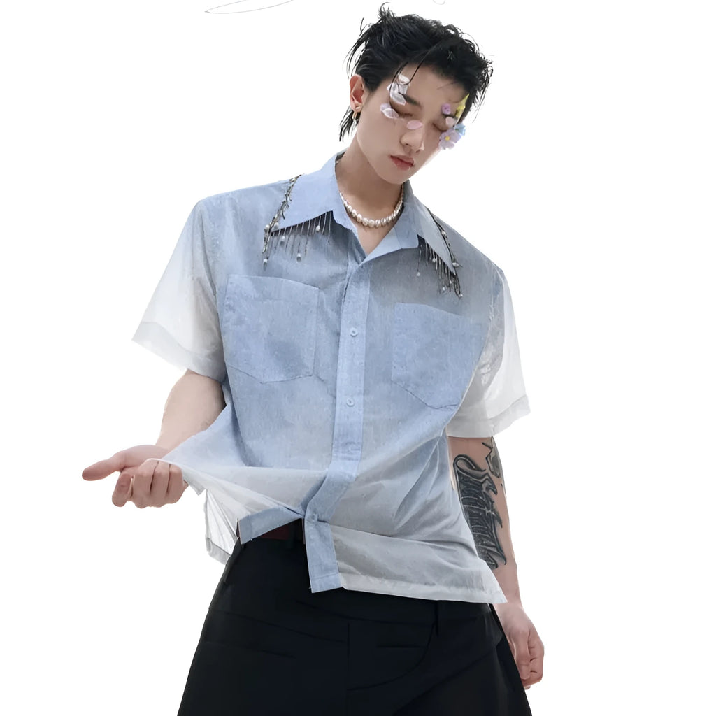 Blue and white gradient short-sleeved loose fit shirt on a hanger.