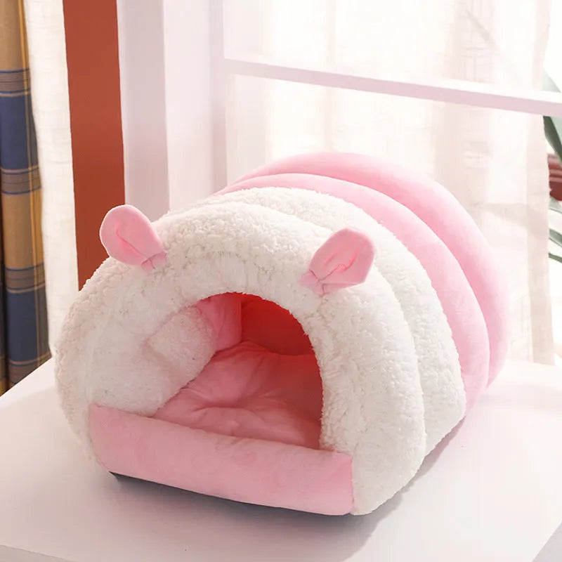 Blue enclosed cat nest with a soft fleece interior and a removable cushion, shown next to a ruler indicating its 40cm by 50cm size.