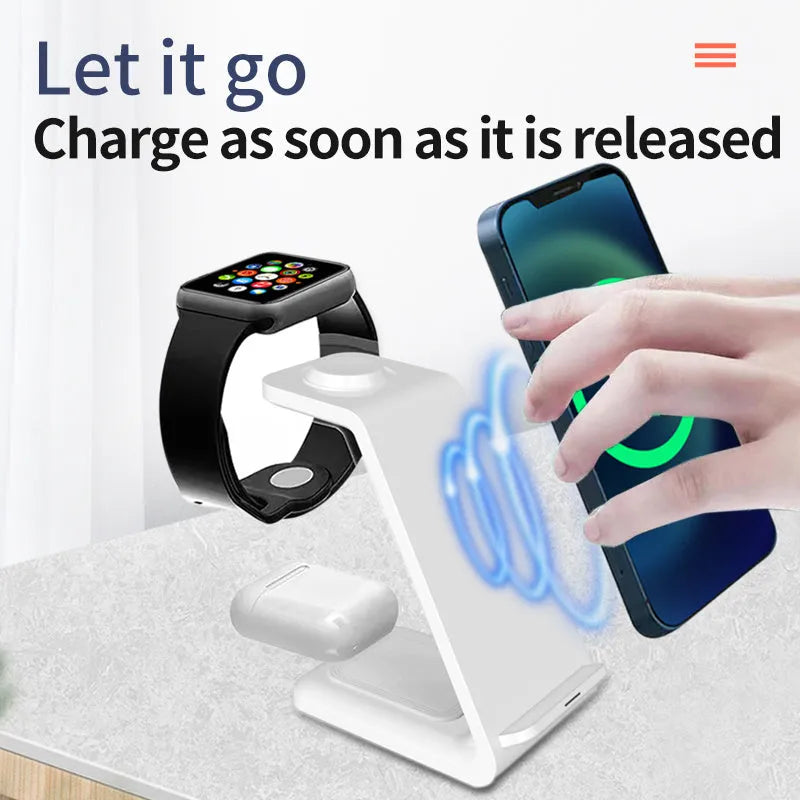 White 3-in-1 upright mobile phone holder and wireless charger with USB port on a desk.