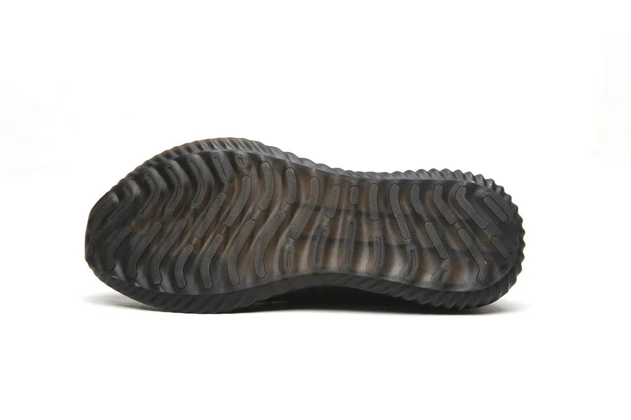 Low-cut black safety shoes with a steel toe cap on a plain background.