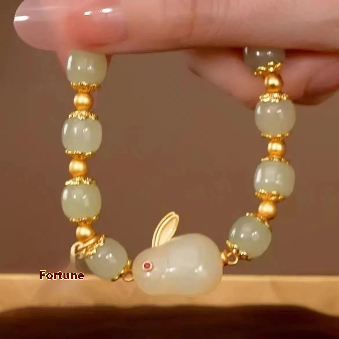 Green jade hare bracelet for women with electroplated finish and Chinese style animal design