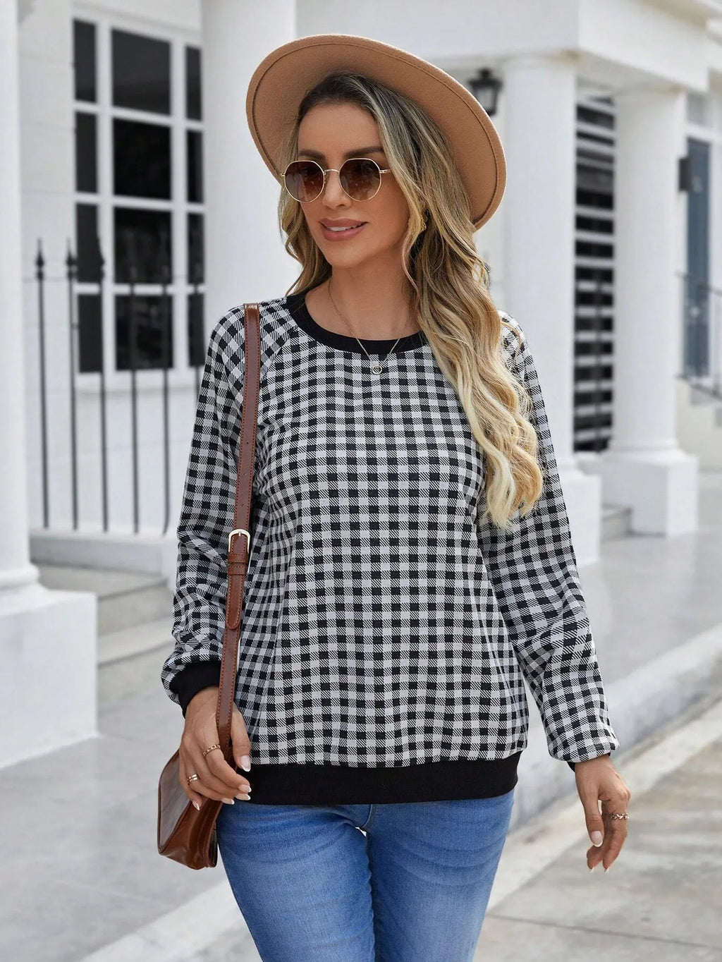 Black pullover sweater with Japanese plaid and printed stripe patterns, long sleeves