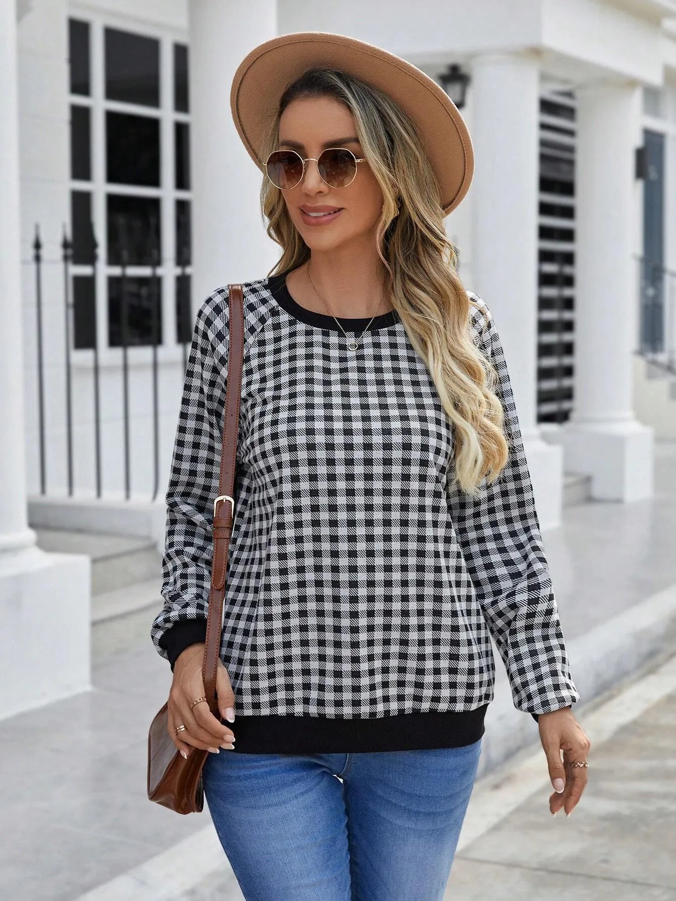 Black pullover sweater with Japanese plaid and printed stripe patterns, long sleeves