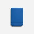 Slim black magnetic phone holder case with MOVAS leather texture on a magnetic car mount.