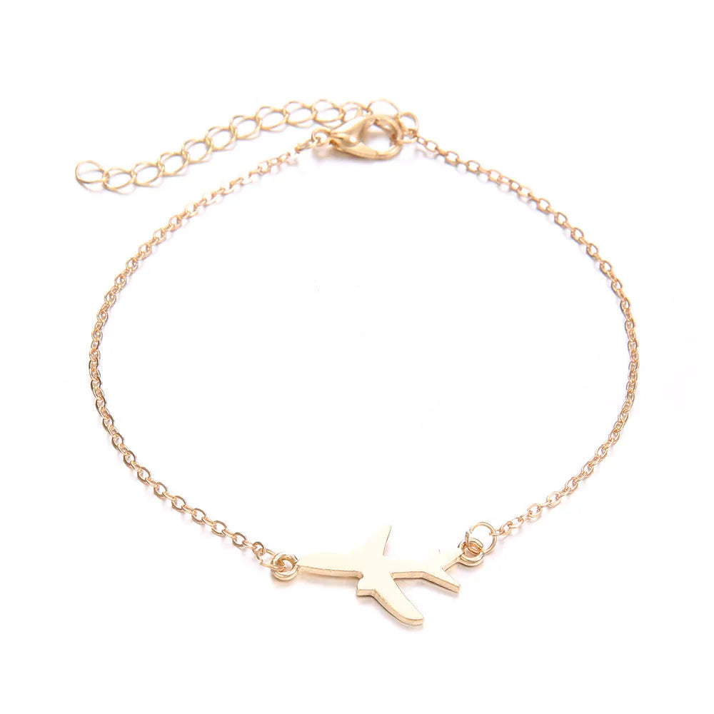 Three bohemian aircraft map charm bracelets with heart-shaped alloy charms in electroplated finish
