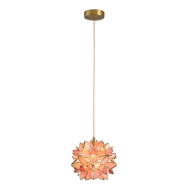 Stained glass line chandelier hanging from ceiling with colourful glass shades and copper lamp head