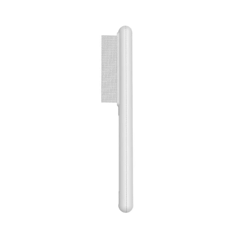 Green and white stainless steel cat comb with rounded teeth for grooming and flea removal