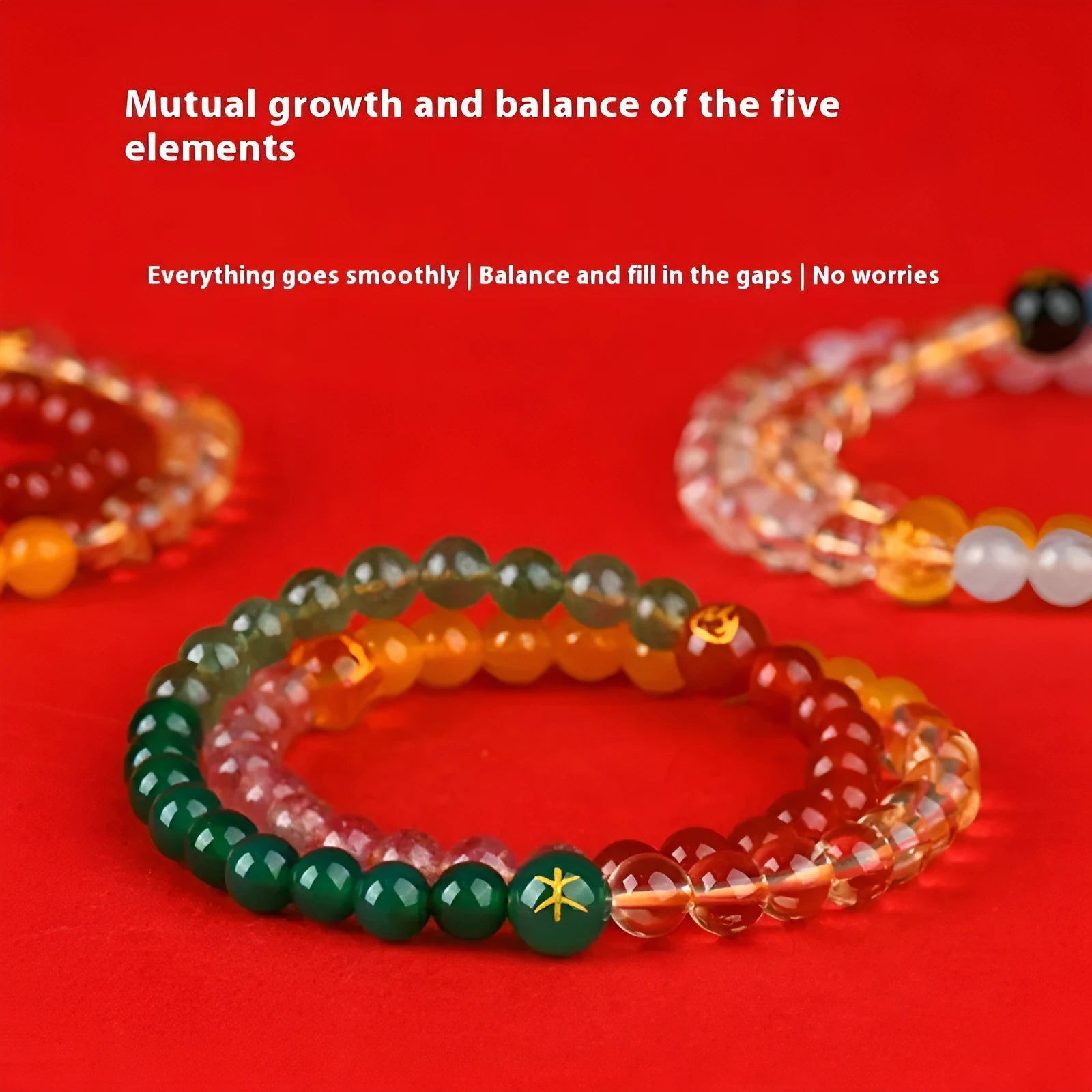Handmade double ring crystal bracelet in five elements colours on a wrist.
