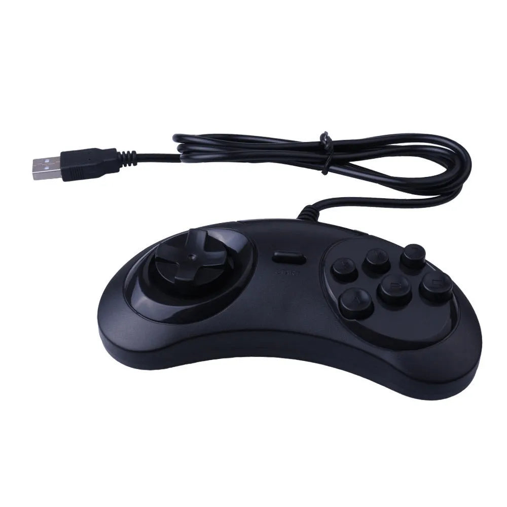 Black Sega USB wired PC game controller with 1.8-metre cable next to a computer.