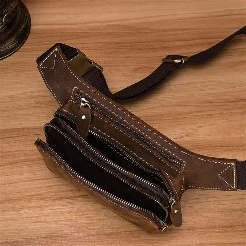 Brown top-layer cowhide leather men's sports waist bag with a zipped closure.