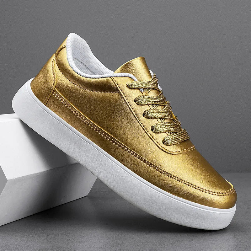 Women's white leather flat casual shoes with front lace-up design on a neutral background.