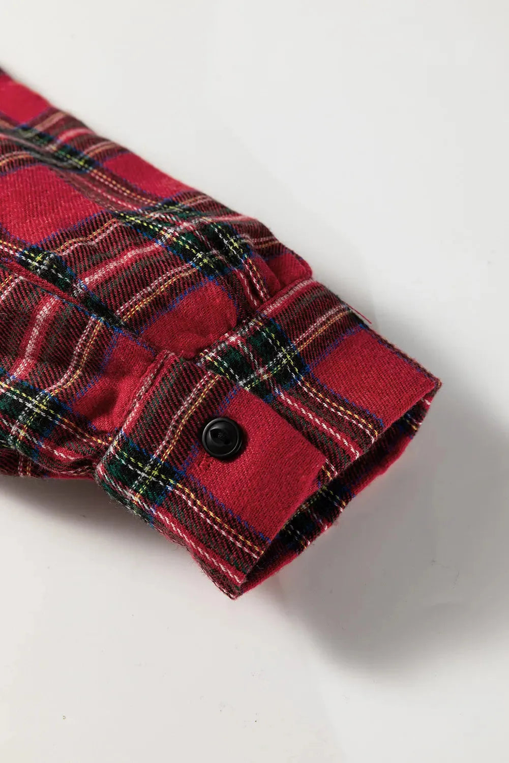 Red plaid shirt collar mini dress with long sleeves, half-button front, and ruffle hem.