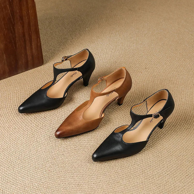 Brown women's retro sandals with a buckle T-strap, closed round toe, and a chunky short heel.
