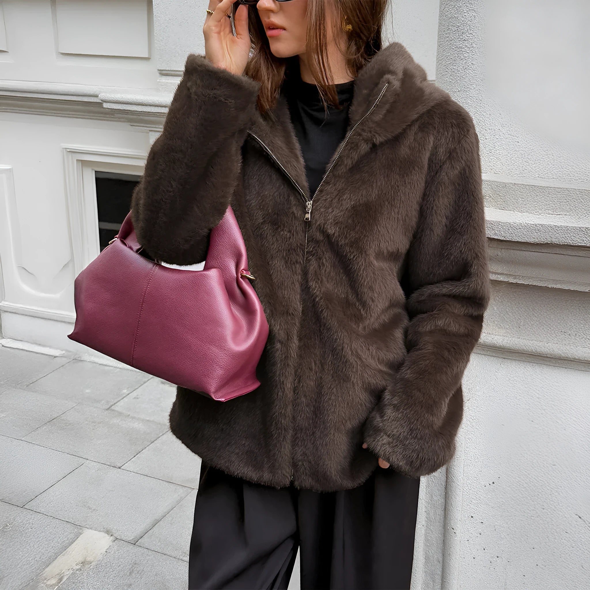 Women's brown polyester coat with fur collar, long sleeves, and regular fit on display
