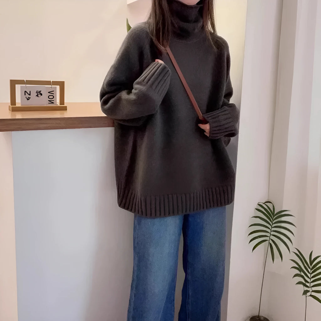 Women's loose-fit turtleneck sweater with curling pile collar in red solid colour