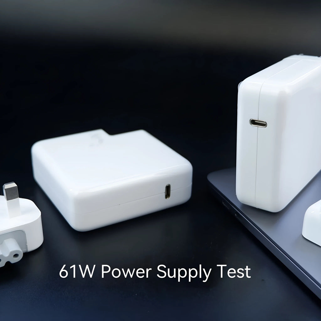 Laptop power adapter with choice of international plugs and a USB-C to USB-C cable.