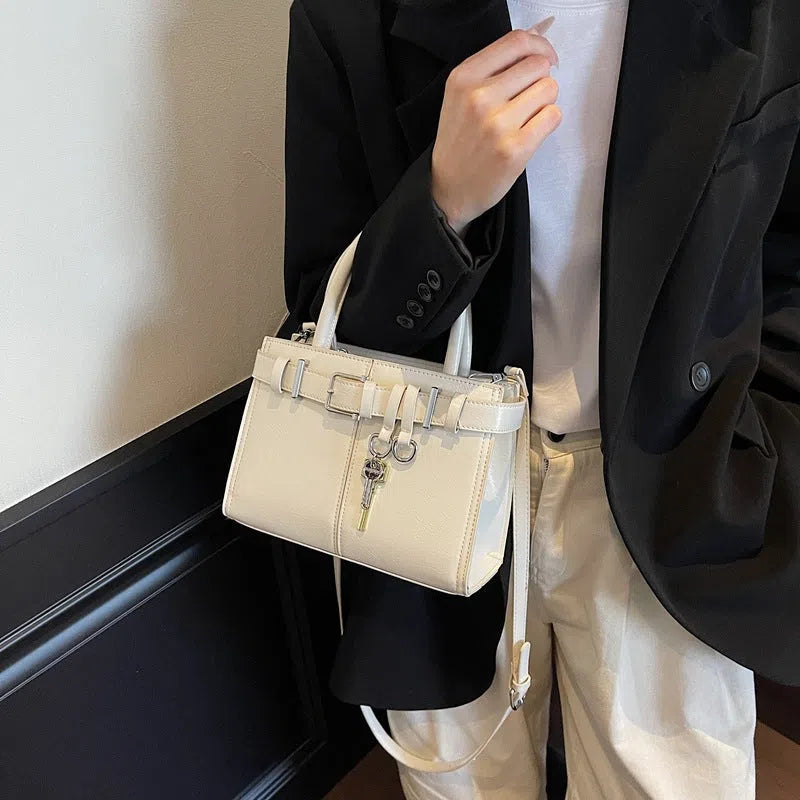 Women's PU crossbody bag in horizontal rectangle shape with three shoulder straps and phone pocket, 23x9x17cm