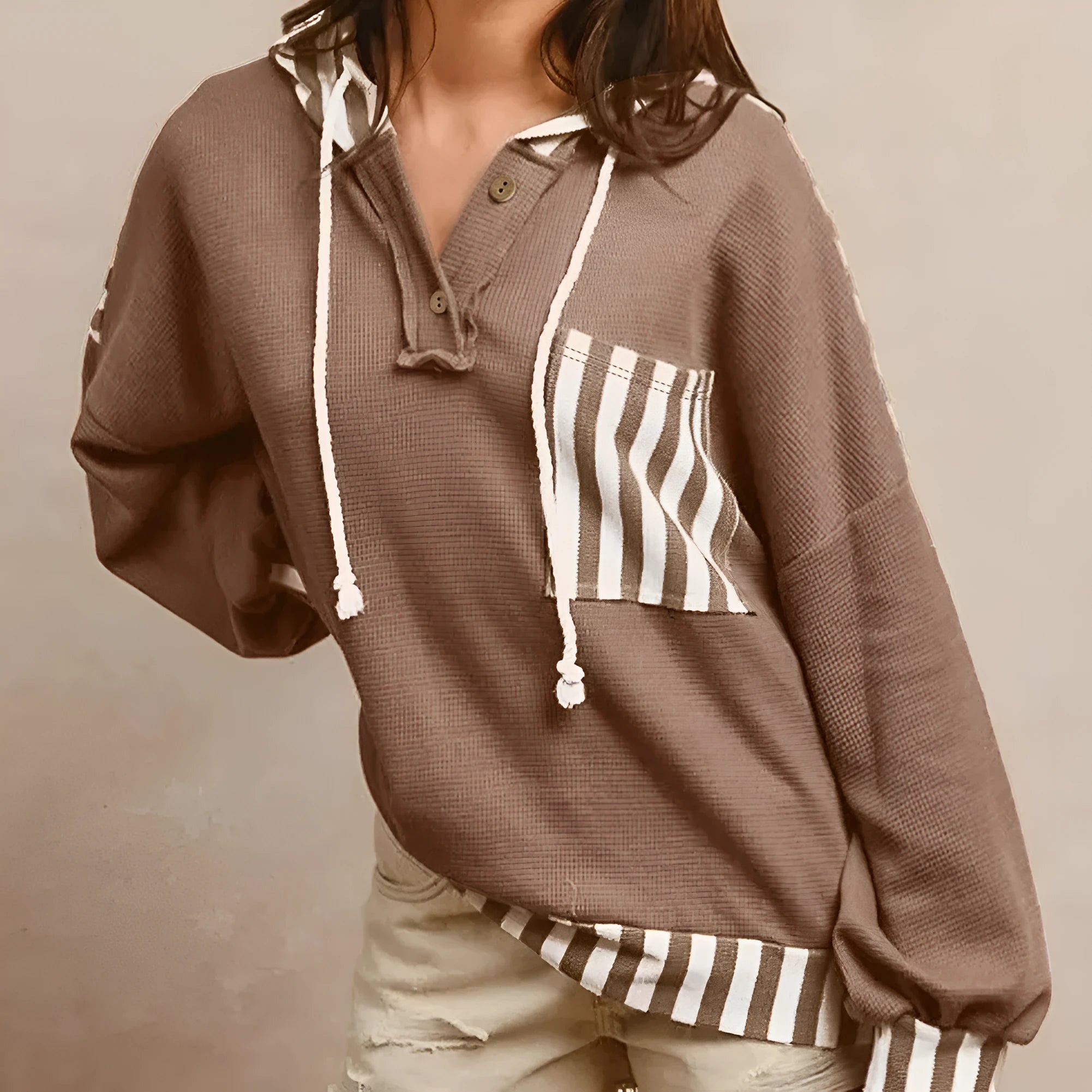 Straw yellow waffle texture striped patchwork hoodie with a button neck and drawstring hood.